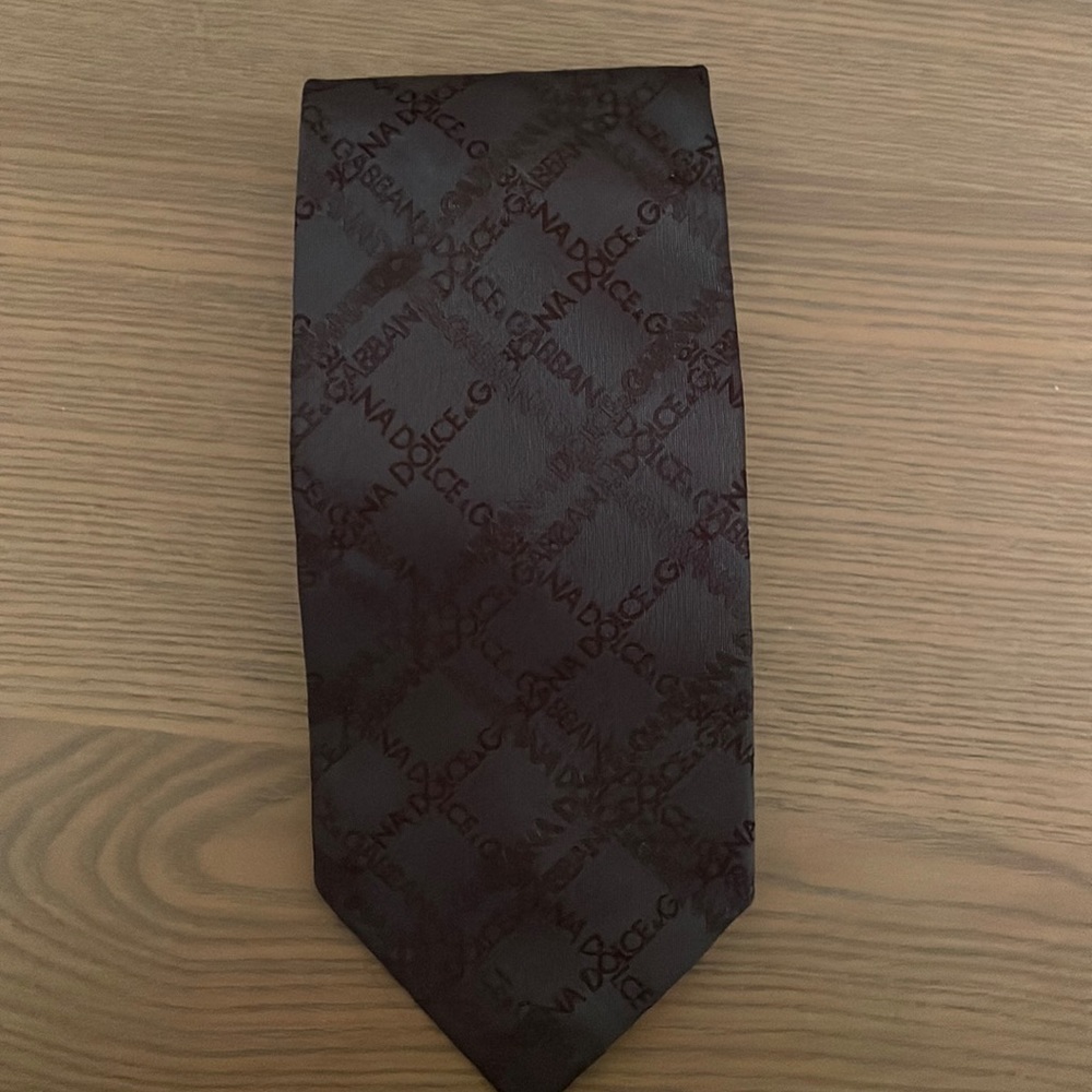 Mens Dolce Gabbana tie. Bluey/grey colour with embossing of brand.